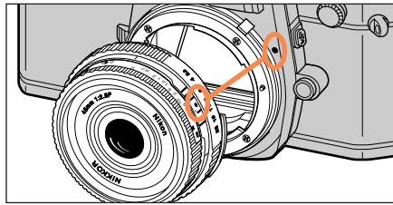 NIKON FM3A - Alignez les repères de fixation de l'objet et du boîtier. - 1