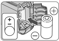Diagram showing battery charging process with positive and negative charges, including a battery cell and switch mechanism