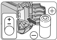 Diagram illustrating battery charging process with positive and negative charges labeled
