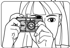 NIKON LITE TOUCH ZOOM 130ED-QD - Prise en main correcte de l'appareil - 1