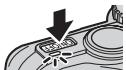 Diagram showing a device with a downward arrow and a labeled button, likely indicating a process or operation.