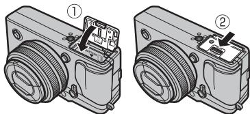 FUJIFILM PREMIUM X-PRO1 - Fermez le couvercle du compartment de la batterie. - 1