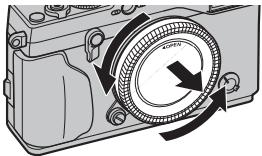 FUJIFILM PREMIUM X-PRO1 - Retirez le bouchon du boitant et le bouchon arrriere de l'objectif. - 1