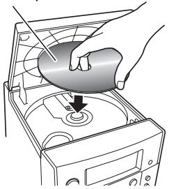 JVC UX-GP1E - Pour mettre un disque en place - 2