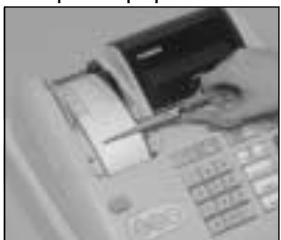 CASIO TE-M80 - Retirer le rouleau de papier du journal - 2
