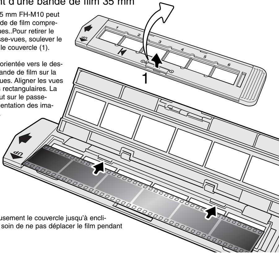 15 mm FH-M10 peut de de film compre- es..Pour retirer le se-vues, soulever le le couvercle (1). orientée vers le des- ande de film sur la vues. Aligner les vues rectangulaires. La ut sur le passe- entation des ima- nusement le couvercle jusqu'à encli- soin de ne pas déplacer le film pendant