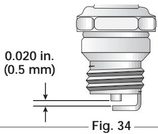 MTD TB25CS - CAMBIO DE LA BUJIA DE ENCENDIDO - 2