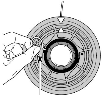 MTD TB575SS - Winding the Inner Reel With New Line - 3