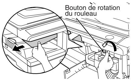 OLIVETTI D-COPIA 200D E D-COPIA 201D - Tournez le bouton de rotation du rouleau dans lesens de la flèche et dégazez précisatement le papier bloqué de la zone de sortie. - 1