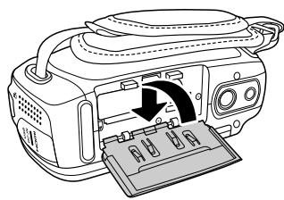 MEDION LIFE X47032 MD 86652 - Refermer le compartiment pour batterie et carte mémoire - 1