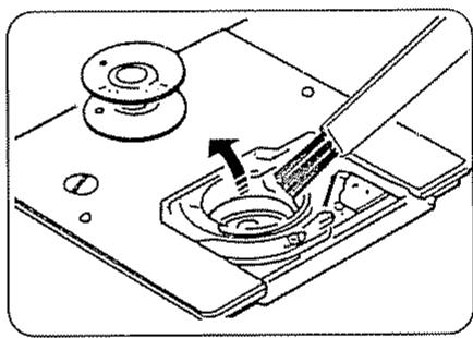 JANOME EASY JEANS 22 - Nettoyage du porte-canette - 2