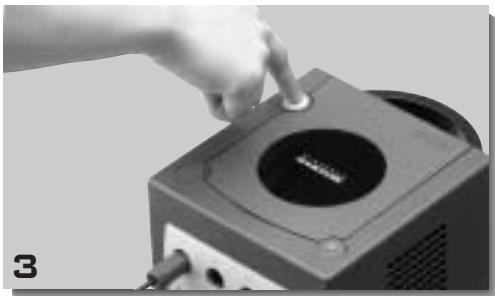 NINTENDO GAMECUBE - POUR RETIRER UN DISQUE DE JEU - 3