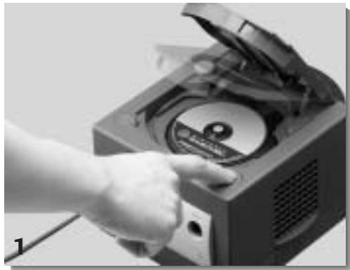 NINTENDO GAMECUBE - POUR RETIRER UN DISQUE DE JEU - 1