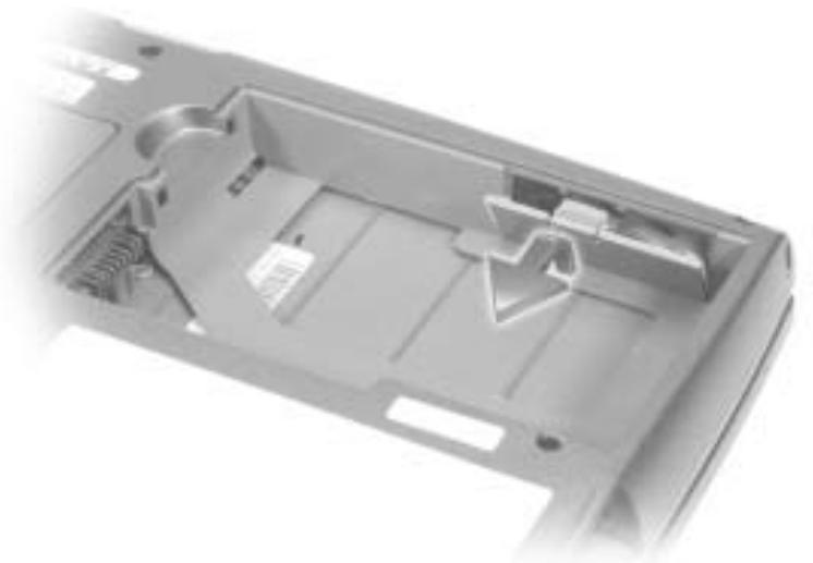 DELL D600 - Retrait et installation d'une batterie de réserve - 1