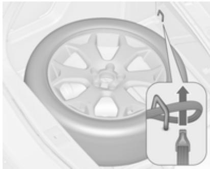 OPEL ASTRA IV - Rangement d'une roue de taille normale endommagée, modèle berline 3 portes et 5 portes - 1