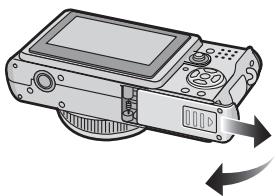 LEICA D-LUX 3 - Faites coulisser le couvercle du logement de carte et de batterie pour l'ouvrir. - 1