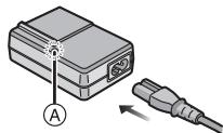 LEICA D-LUX 5 - Collegare il caricabatterie alla rete elettrica. - 2