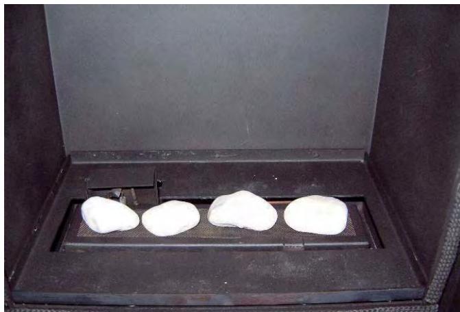 WANDERS NORMA FREE - Plaatsen van de keramische pebble stenen (aardgas en propaan) - 1