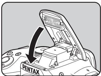 PENTAX K-50 - Appuyez sur le haut du flash pour rétractor le flash incorpore. - 1