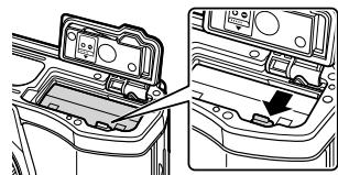 OLYMPUS OM-D E-M5 - Retrait de la batterie - 1