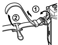 OLYMPUS OM-D E-M5 - Fixation de la courroie - 1