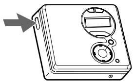 SONY MZ-R410 - Insert an MD. - 1