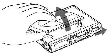 SONY MZ-R37 - Introduisez un MD. - 1