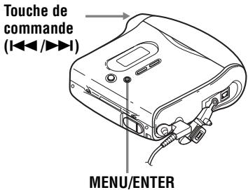 Touche de commande (<◀◀/▶◀)