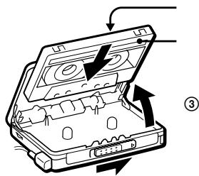 Diagram of a cassette tape device with labeled parts and directional arrows indicating movement or assembly.