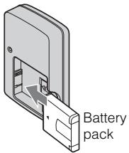 SONY CYBER-SHOT DSC-WX1 - Insert the battery pack into the battery charger. - 1