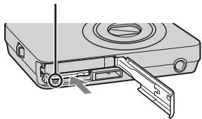 SONY CYBER-SHOT DSC-WX1 - Pour retire le « Memory Stick Duo » - 1