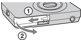 SONY CYBER-SHOT DSC-WX1 - Inserting the battery pack/a "Memory Stick Duo" media (sold separately) - 1