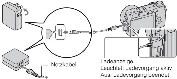 SONY NEX-6B - Verbinden Sie Kamera und Netzgerät (mitgeliefert) mit dem Micro-USB-Kabel (mitgeliefert). Schließen Sie das Netzgerät an eine Netzsteckdose an. - 1