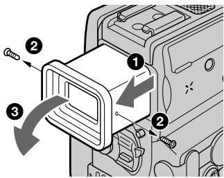 Diagram showing a device with labeled parts and directional arrows indicating movement or assembly.