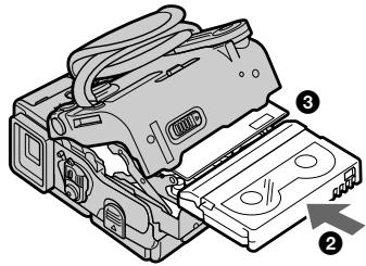 Technical diagram of a cassette tape assembly with numbered parts and directional arrows indicating assembly steps