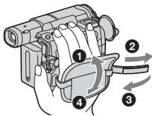 SONY DCR-TRV22E - Fastening the grip belt - 1