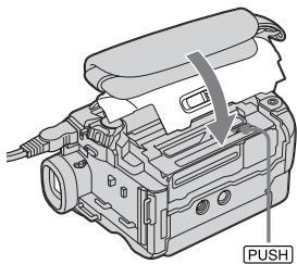 SONY DCR-TRV22E - Inserting the cassette - 4