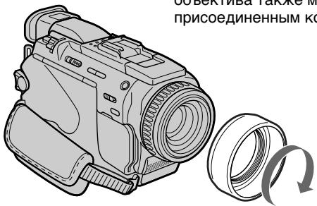 SONY DCR-TRV30E - Присоединение поставляемого колпачка объектива - 1