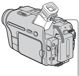Line drawing of a DSLR camera with no visible text or symbols