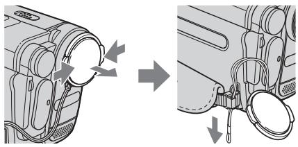 Diagram showing two views of a vehicle's rear compartment with cable and lock, no text or symbols present