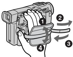 Diagram of a handheld device with numbered parts and directional arrows indicating motion or assembly steps