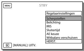 SONY HDR-PJ780VE - Het menu-item toewijzen aan de keuzeknop MANUAL - 1