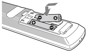 SONY KDL-26U2000 - To insert batteries into the remote - 1
