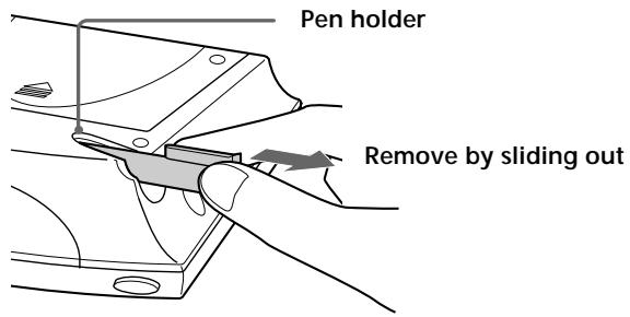 Pen holder Remove by sliding out
