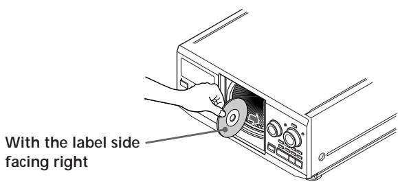 SONY CDP-CX355 - Inserting CDs - 6