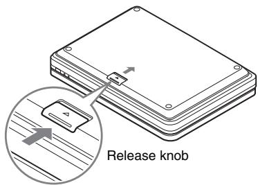 SONY DVP-FX870 - To remove the battery pack - 1