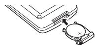 PANASONIC NV-GS24 - Insérez le support de la pile dans la télécommande. - 1