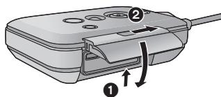 PANASONIC HX-A100 - Fermez fermement le couvercle latéral. - 1
