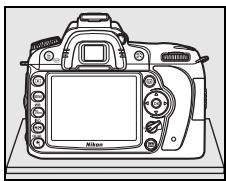 NIKON D90 - Posez l'appareil photo sur sa base. - 1