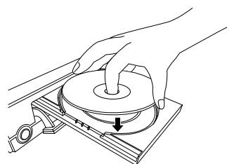 TOSHIBA HD-A2 - Placez un disque à l'intérieur de la section creuse avec la face de la lecture orientée vers le bas. - 1